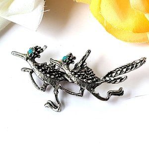Running Roadrunners Brooch Silver Tone Blue Accents on Eyes